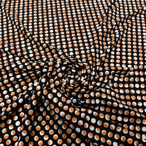 Tessuto Crepe a fantasia motivo pois nero - beige - tabacco