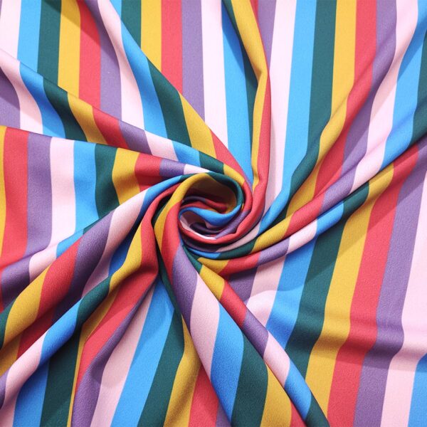 Tessuto Crepe a fantasia motivo rigato rosso - viola - rosa - verde petrolio
