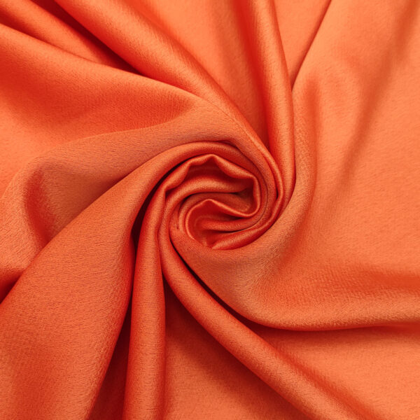 Tessuto Crepe Cady elasticizzato tinta unita arancione