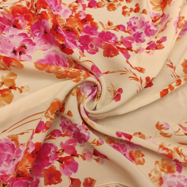 Tessuto Crepe de chine a fantasia motivo floreale ecrù - arancio - fucsia