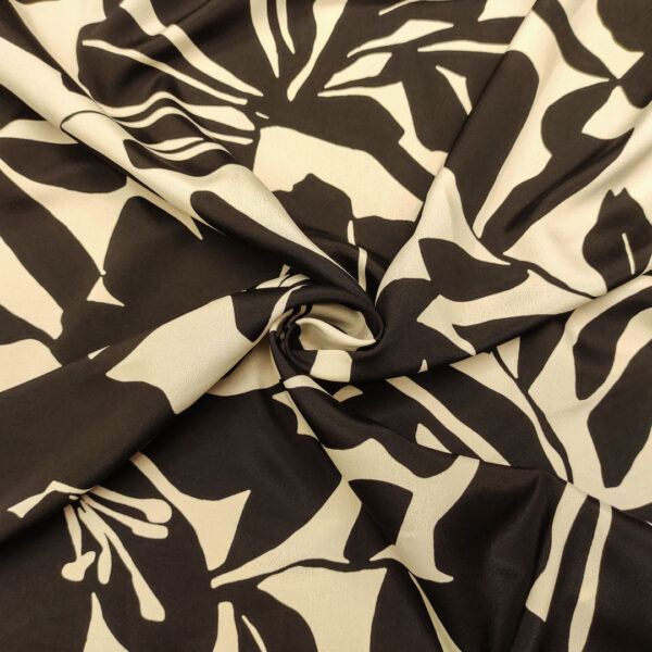 Tessuto Crepe de chine a fantasia motivo floreale panna - nero