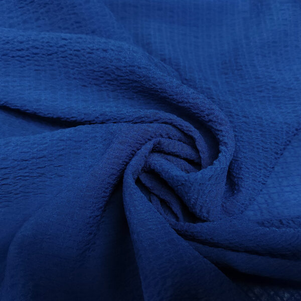 Tessuto Crepe goffrato tinta unita azzurro