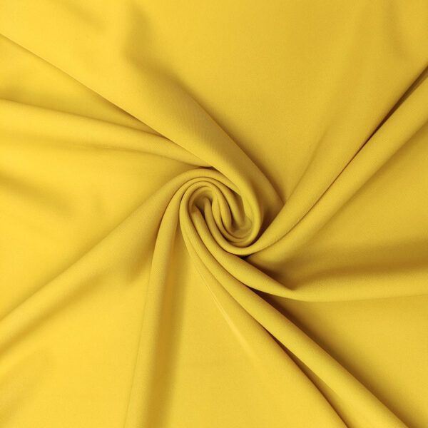Tessuto Crepe morbido Elegance tinta unita mostarda