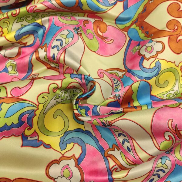Tessuto Duchesse a fantasia motivo astratto rosa - giallo - turchese