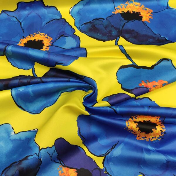 Tessuto Duchesse a fantasia motivo floreale giallo - blu elettrico