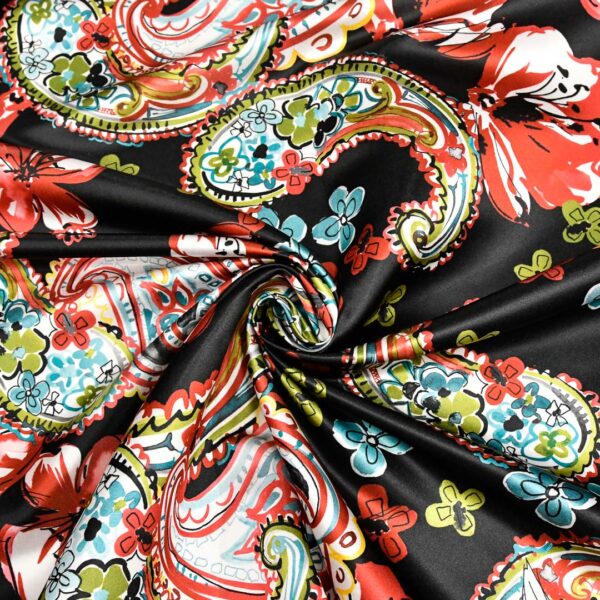 Tessuto Duchesse a fantasia motivo floreale cashmere nero - rosso