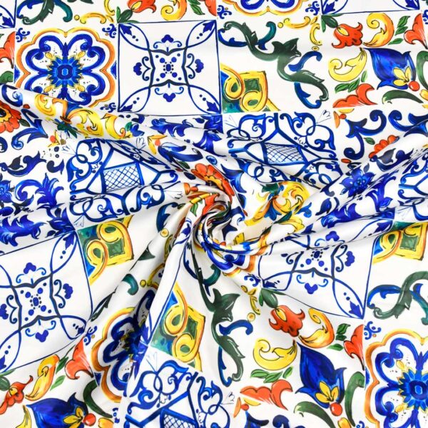 Tessuto Duchesse a fantasia motivo geometrico bianco - giallo - blu