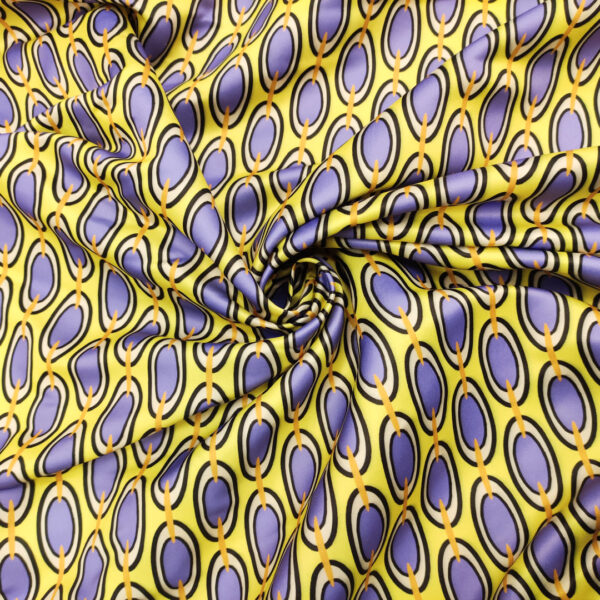 Tessuto Duchesse a fantasia motivo geometrico lilla - lime