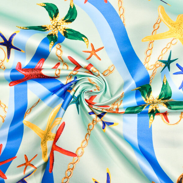 Tessuto Duchesse a fantasia motivo marino verde acqua - blu elettrico - rosso