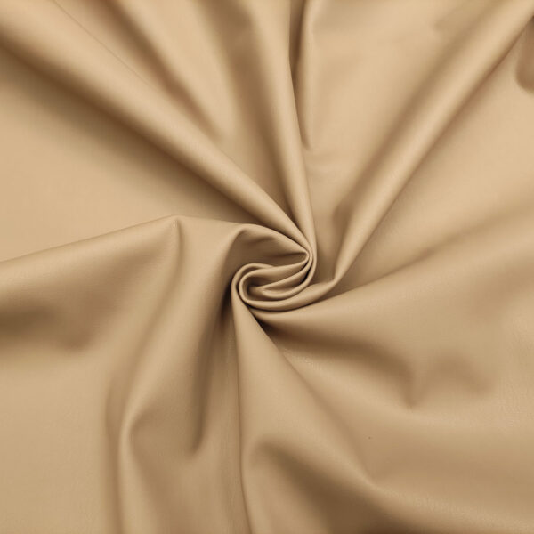 Tessuto Ecopelle per abbigliamento doppiato con camoscio tinta unita beige