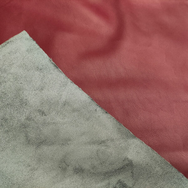 Tessuto Ecopelle per abbigliamento doppiato con camoscio tinta unita bordeaux