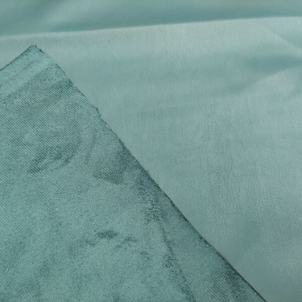 Tessuto Ecopelle per abbigliamento doppiato con camoscio tinta unita petrolio