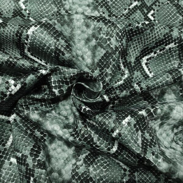 Tessuto Ecopelle per abbigliamento motivo animalier grigio - nero