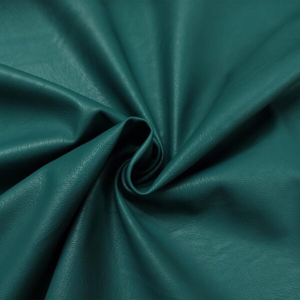 Tessuto Ecopelle per abbigliamento tinta unita verde petrolio