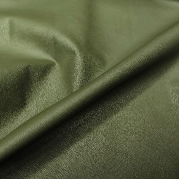Tessuto Ecopelle per abbigliamento tinta unita verde militare