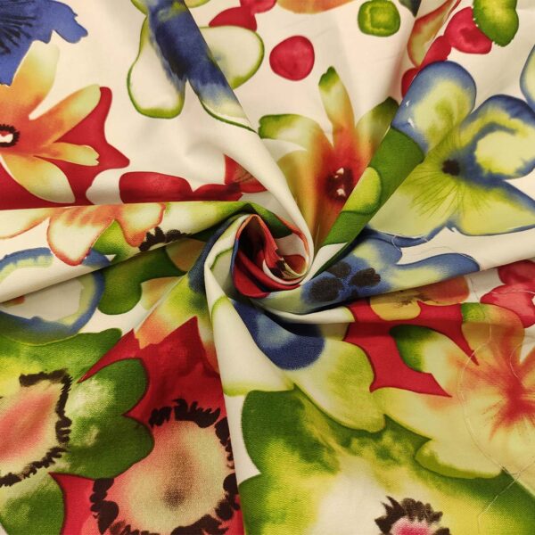 Tessuto Gabardine di Cotone a fantasia motivo floreale bianco - verde - rosso - blu
