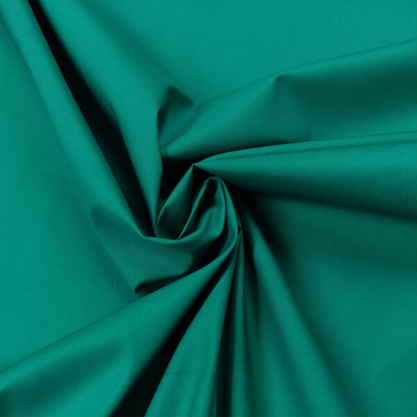 Tessuto Gabardine di cotone tinta unita verde petrolio