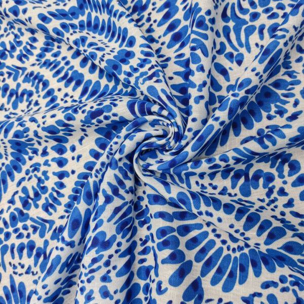 Tessuto Garza di lino a fantasia motivo astratto bianco - blu elettrico