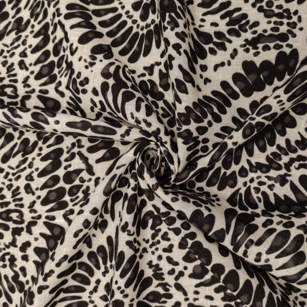 Tessuto Garza di lino a fantasia motivo astratto bianco - nero