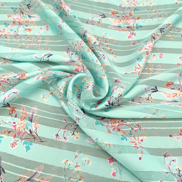 Tessuto Georgette a fantasia con filo lurex motivo floreale verde acqua - rosa - lilla