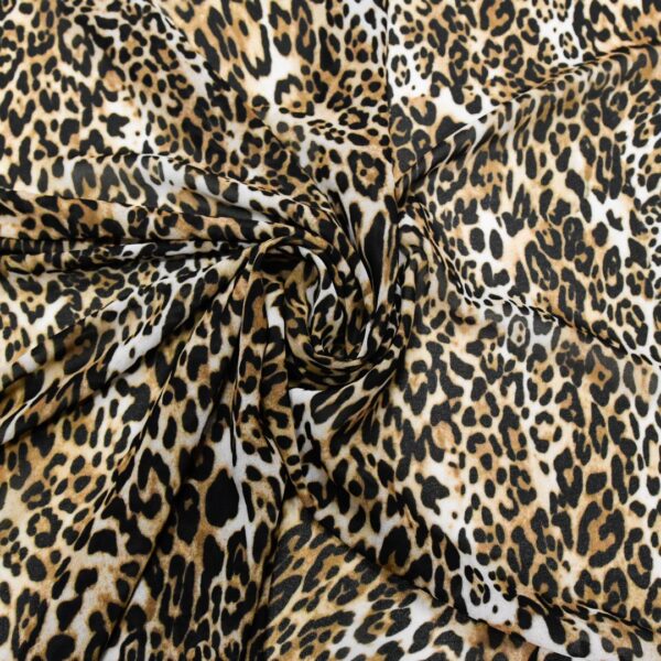 Tessuto Georgette a fantasia motivo animalier beige - nero - marrone