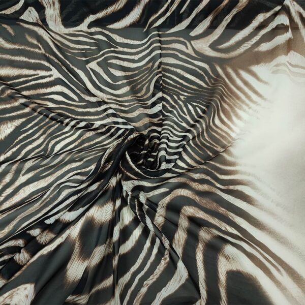 Tessuto Georgette a fantasia motivo animalier beige - nero