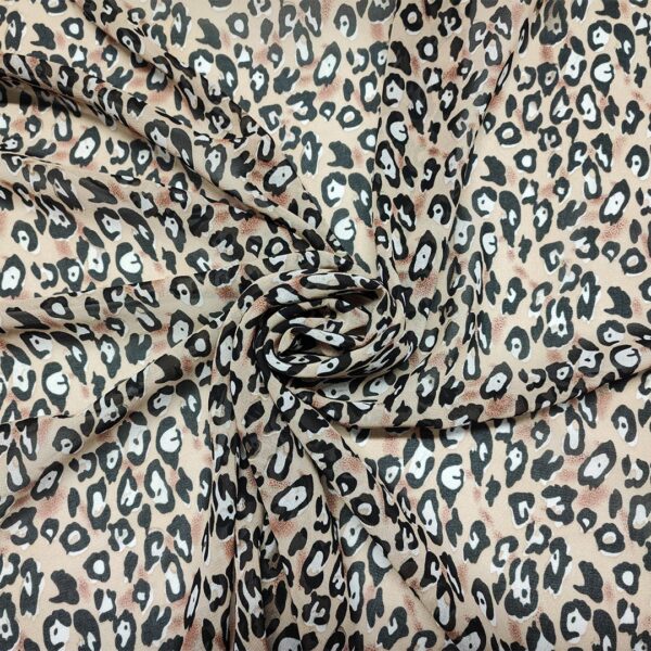 Tessuto Georgette a fantasia motivo animalier beige - nero - panna