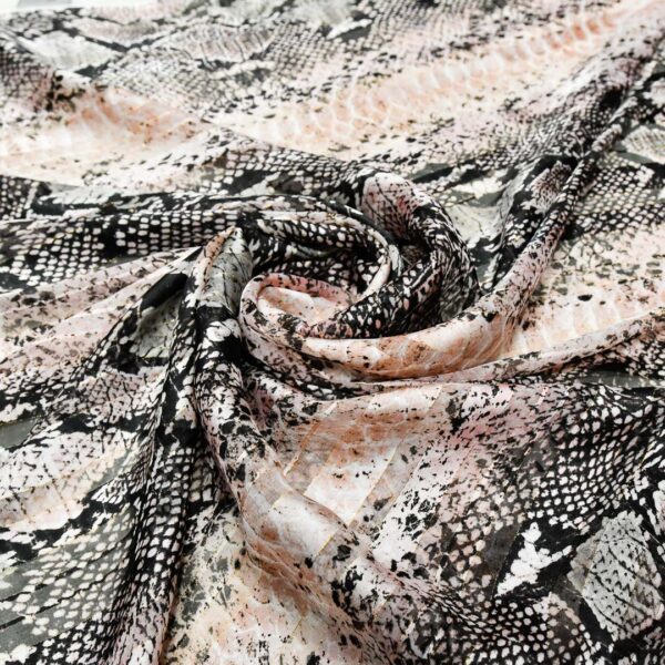 Tessuto Georgette a fantasia motivo animalier rosa antico - nero