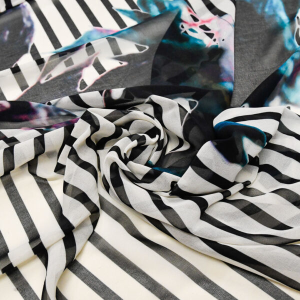 Tessuto Georgette a fantasia motivo astratto bianco - nero - fucsia