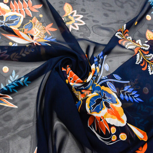 Tessuto Georgette a fantasia motivo astratto blu - giallo