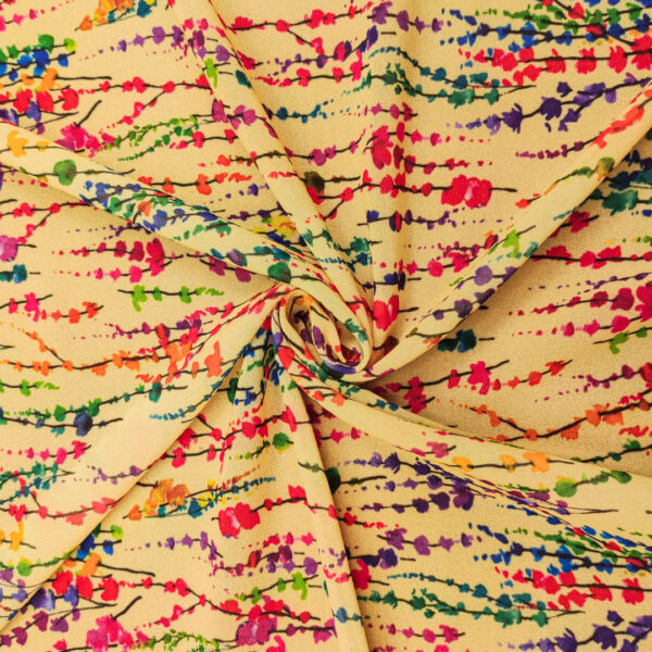 Tessuto Georgette a fantasia motivo astratto giallino - verde - viola