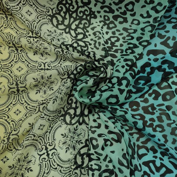 Tessuto Georgette a fantasia motivo astratto giallo - arancione - celeste - verdino