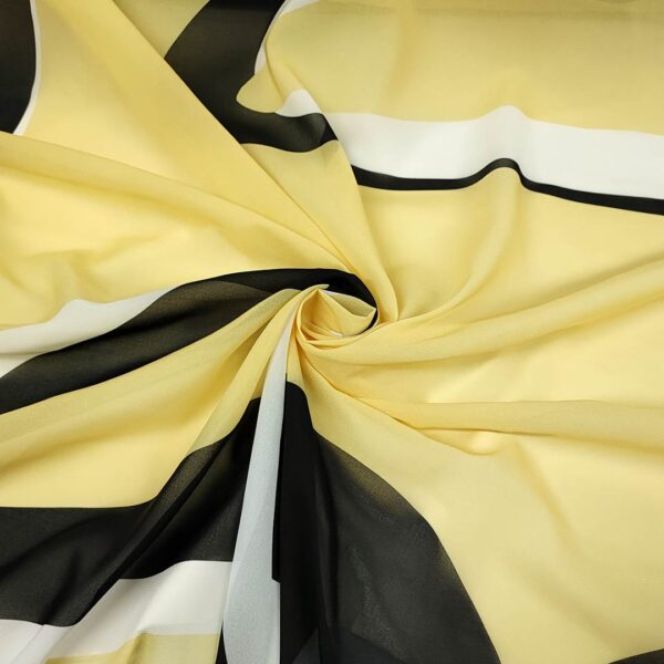 Tessuto Georgette a fantasia motivo astratto giallo - nero - bianco
