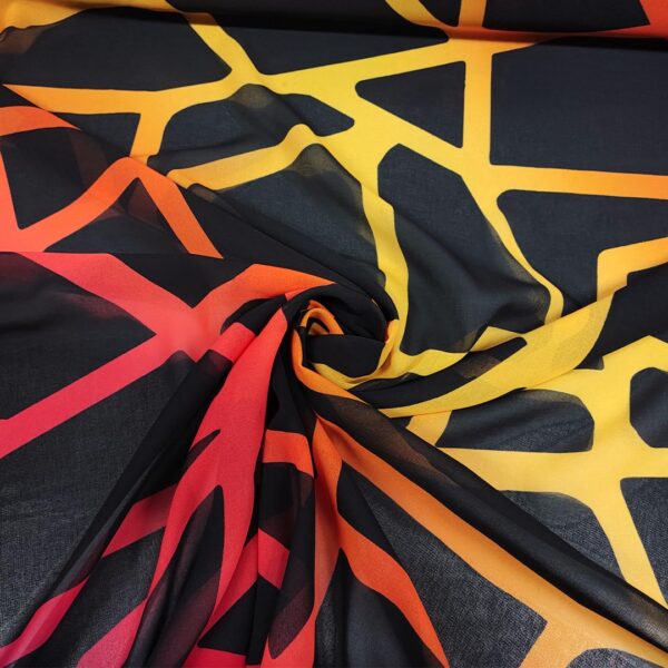 Tessuto Georgette a fantasia motivo astratto nero - giallo - fucsia