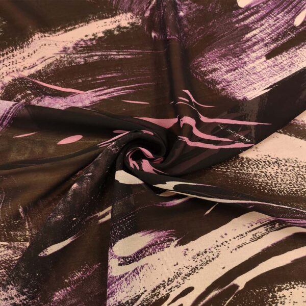 Tessuto Georgette a fantasia motivo astratto nero - rosa - viola