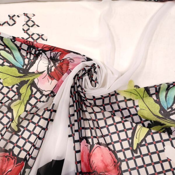 Tessuto Georgette a fantasia motivo astratto nero - bianco - rosso