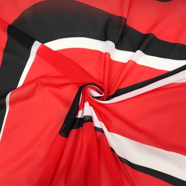 Tessuto Georgette a fantasia motivo astratto nero - rosso - bianco