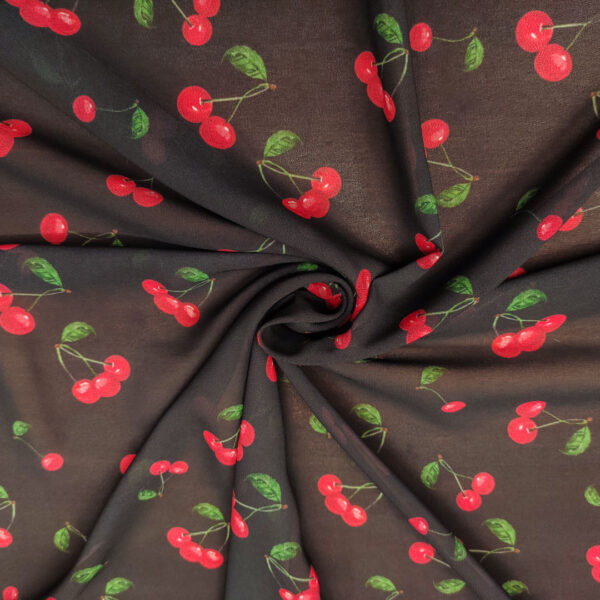 Tessuto Georgette a fantasia motivo astratto nero - rosso - verde