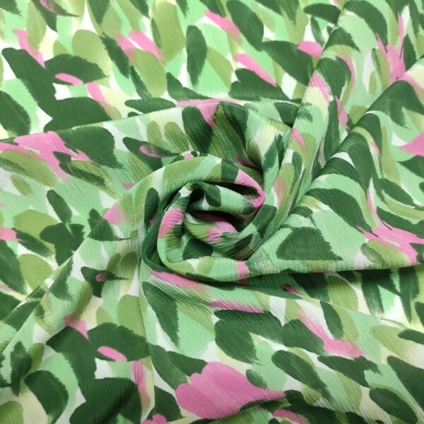 Tessuto Georgette a fantasia motivo astratto verde - fucsia