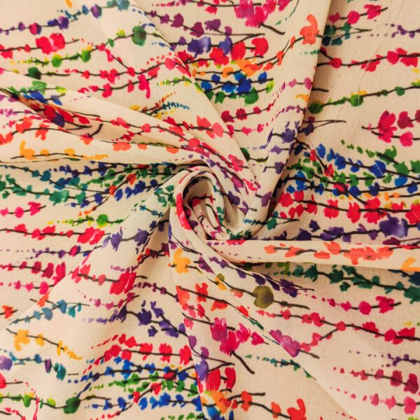 Tessuto Georgette a fantasia motivo astratto fucsia - panna - verde