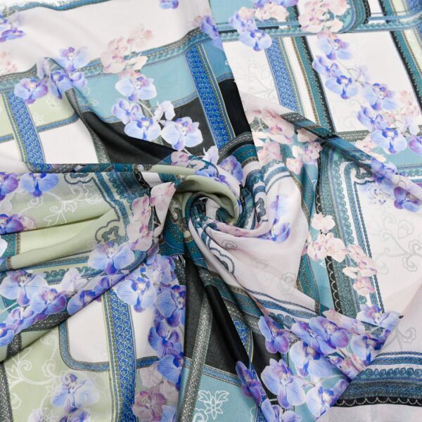 Tessuto Georgette a fantasia motivo astratto verde salvia - lilla