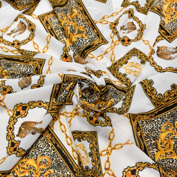 Tessuto Georgette a fantasia motivo floreale barocco bianco - nero - oro