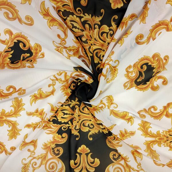 Tessuto Georgette a fantasia motivo floreale barocco nero - bianco - giallo