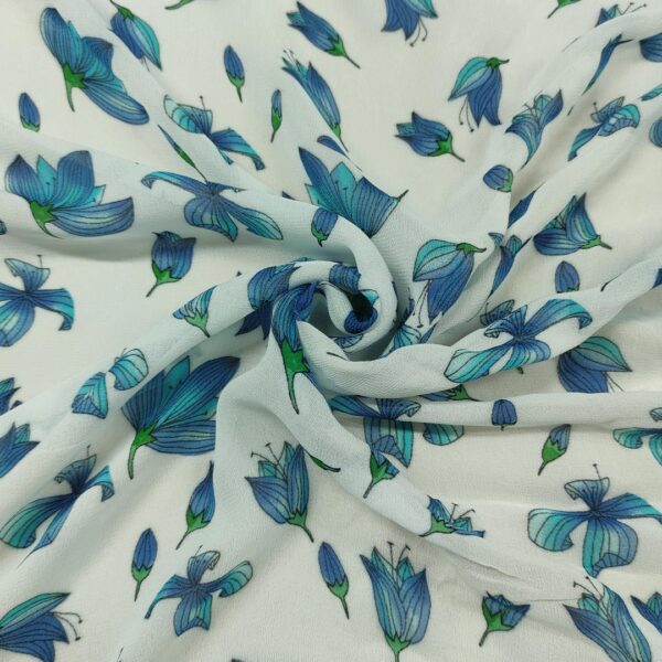 Tessuto Georgette a fantasia motivo floreale bianco - azzurro - verde