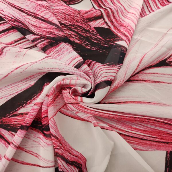 Tessuto Georgette a fantasia motivo floreale fucsia scuro - bianco