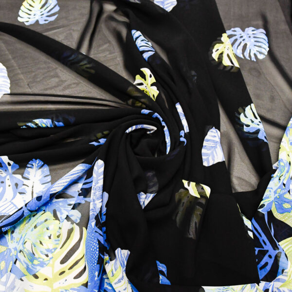 Tessuto Georgette a fantasia motivo floreale blu - nero - verde