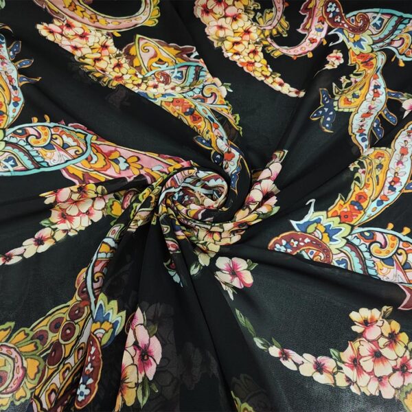 Tessuto Georgette a fantasia motivo floreale cashmere nero - giallo - fucsia