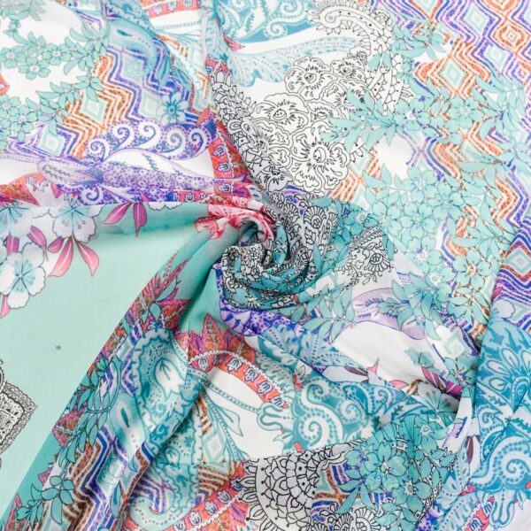 Tessuto Georgette a fantasia motivo floreale cashmere verde tiffany - fucsia