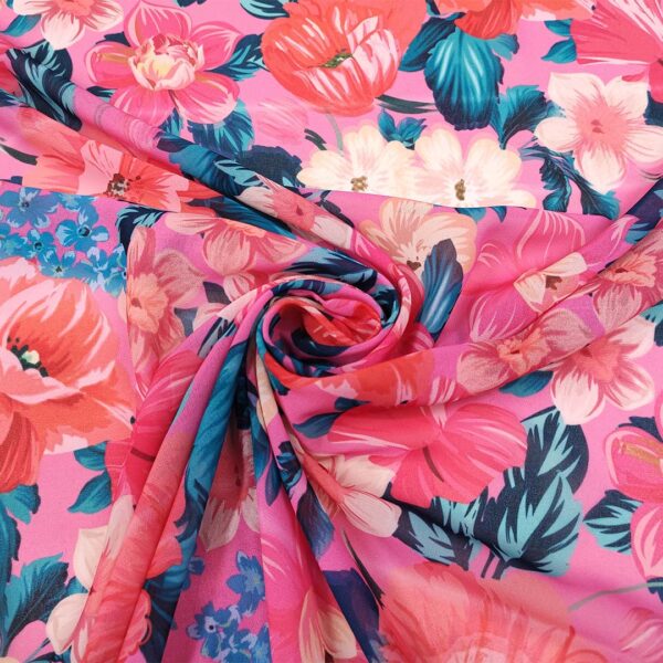 Tessuto Georgette a fantasia motivo floreale fucsia - blu - turchese