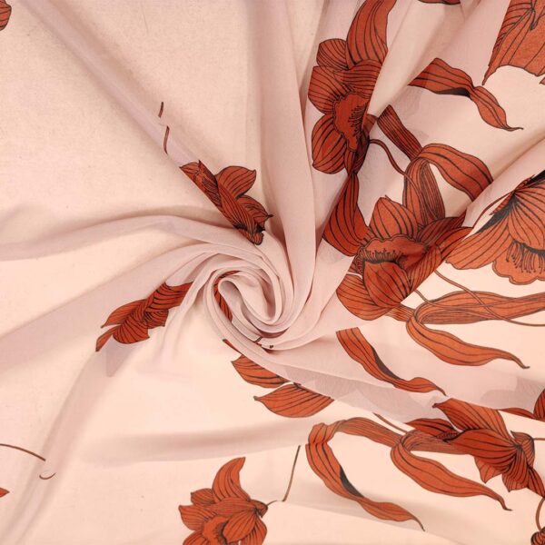 Tessuto Georgette a fantasia motivo floreale rosa - aragosta